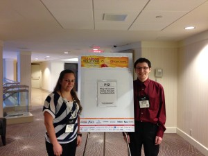 Mike and Laura (IIT students) posing by the session sign.